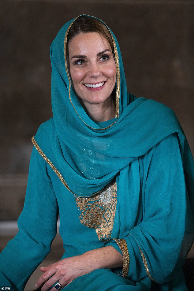 For a visit to Lahore's famed Badshahi Mosque Kate chose a teal silk chiffon kaftan, matching slim trousers and dupatta, embroidered with gold silk phulkari, or flower work, to resemble the hills of Northern Pakistan
