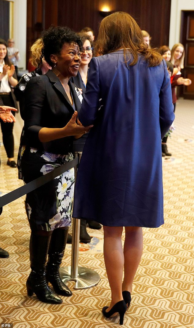 As she greeted the crowd saw Professor Jacqueline Dunkley-Bent - the midwife who helped deliver Princess Charlotte in 2015 - and gave her an enormous hug