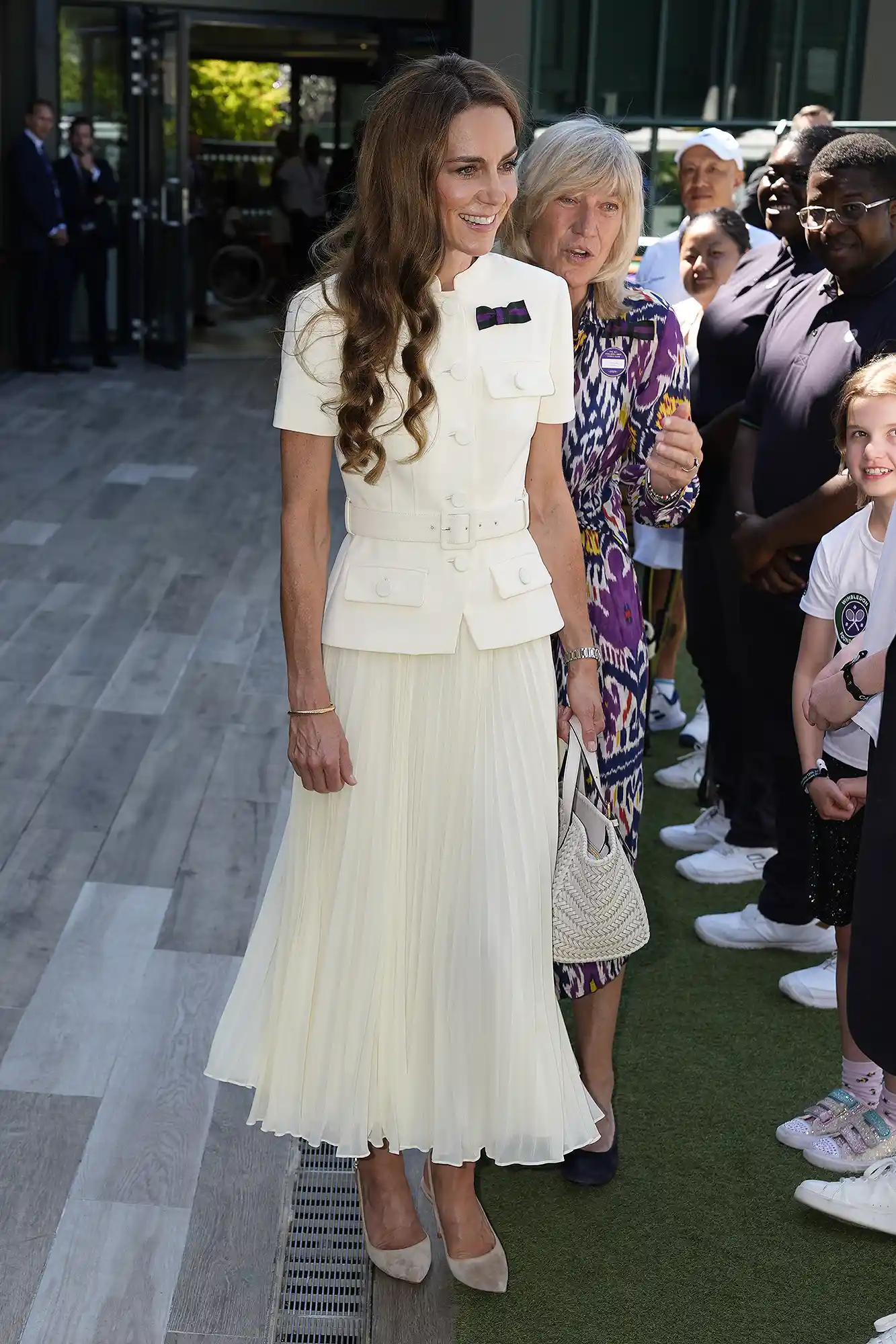 LONDON, ENGLAND - JULY 12: Catherine, Princess of Wales with AELTC chair Debbie Jevans as she arrives to attend the Ladies' Singles Final during day thirteen of The Championships Wimbledon 2025 at All England Lawn Tennis and Croquet Club on July 12, 2025 in London, England