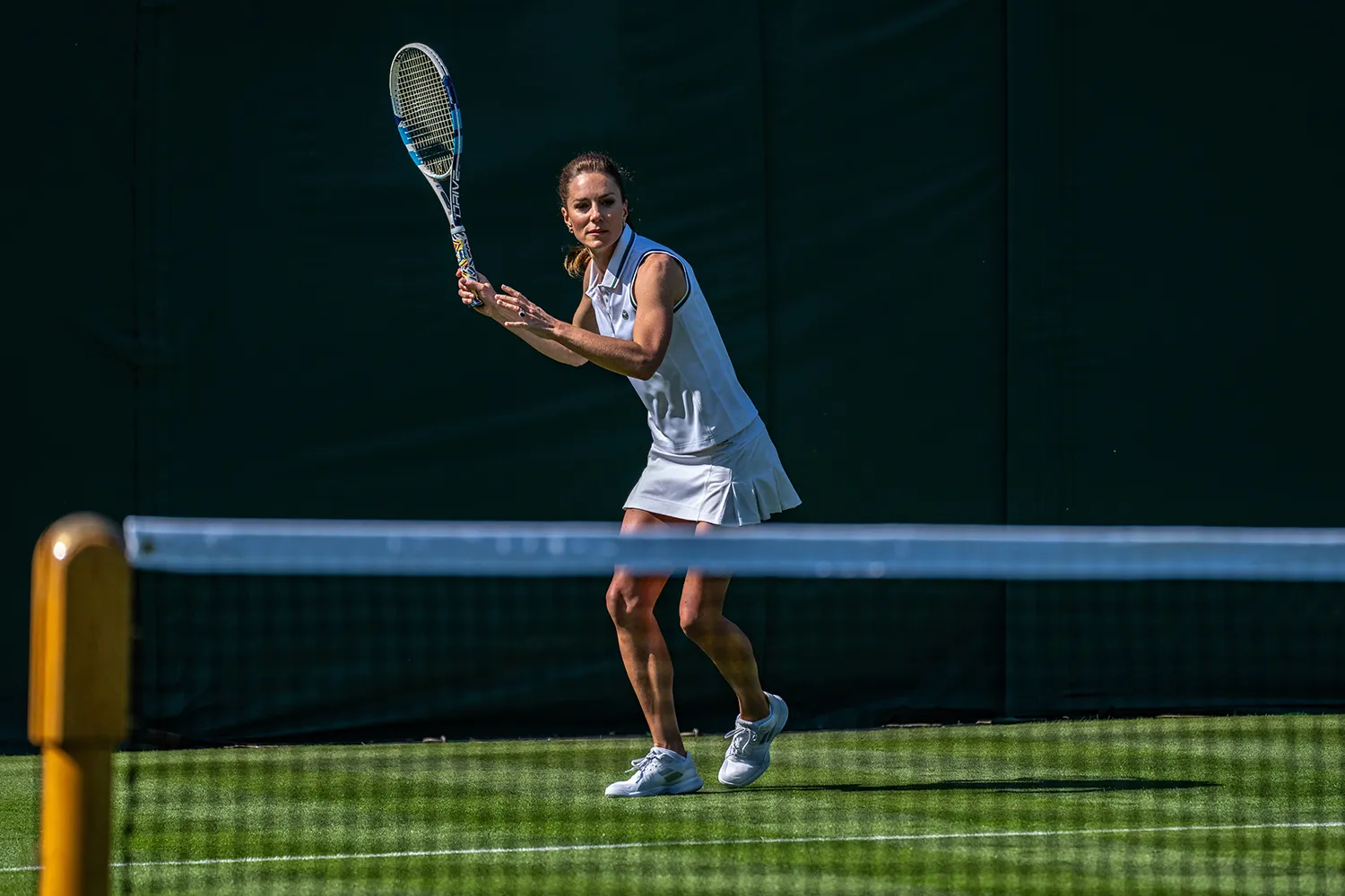 In this handout images released by Kensington Palace on June 24, 2023, Catherine, Princess of Wales playing tennis on No.3 Court at The All England Lawn Tennis Club, Wimbledon, on June 8, 2023 in London, England.