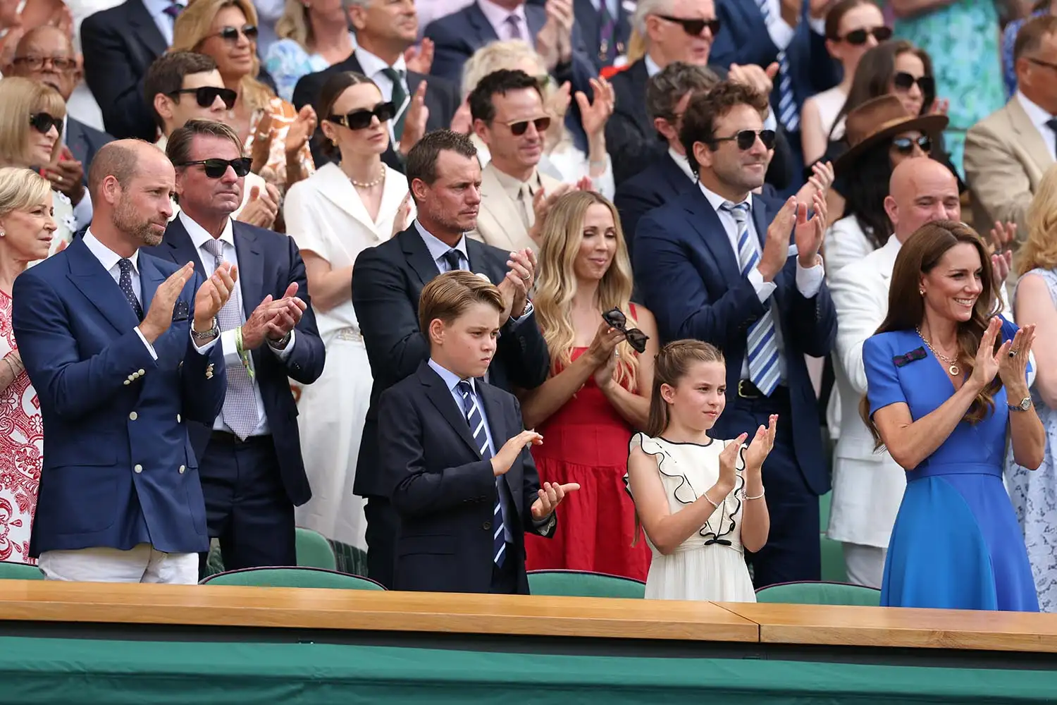 Prince William, Prince of Wales Prince George of Wales, Princess Charlotte of Wales and Catherine, Princess of Wales, Patron of The AELTC applaud from the Royal Box prior to the Gentleman's Singles Final between Jannik Sinner of Italy and Carlos Alcaraz of Spain on day fourteen of The Championships Wimbledon 2025 at All England Lawn Tennis and Croquet Club on July 13, 2025 in London, England.