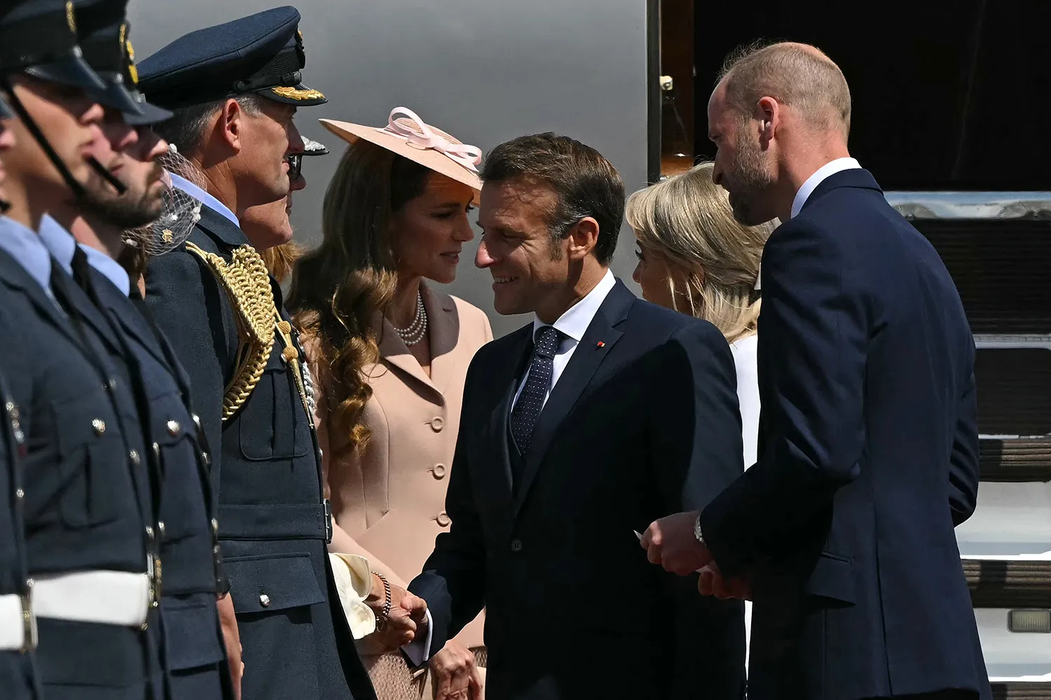 France's President Emmanuel Macron and his wife Brigitte Macron are greeted by Britain's Prince William, Prince of Wales and Britain's Catherine, Princess of Wales upon arrival at RAF Northolt, west of London