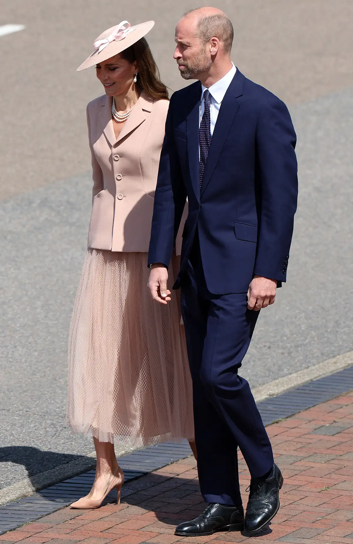Britain's Prince William, Prince of Wales and Britain's Catherine, Princess of Wales arrive to greet France's President Emmanuel Macron and his wife Brigitte Macron, upon arrival at RAF Northolt, west of London