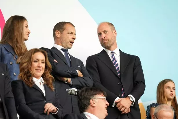 William and Charlotte in the stands