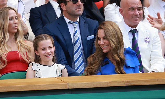Mother and daughter smile as they enjoy the game, with Princes Catherine watching her daughter in adoration