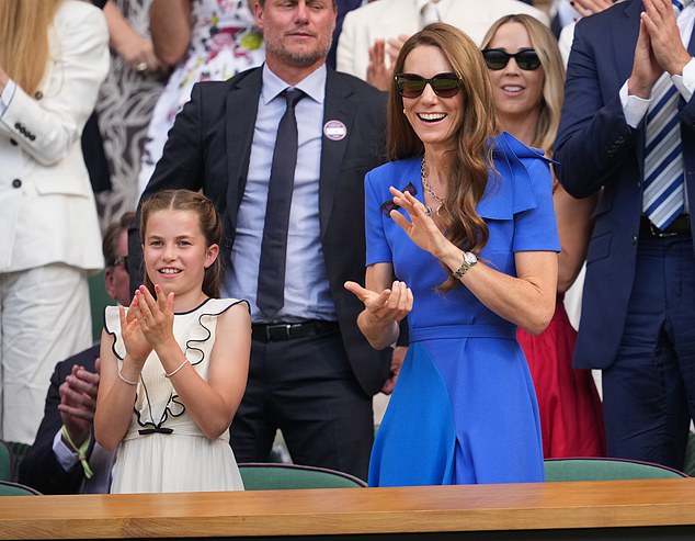 Princess Catherine and Prince William brought their eldest son Prince George, 11, and Charlotte, 10, to watch the Wimbledon final (Catherine and Charlotte applaud from Royal Box)