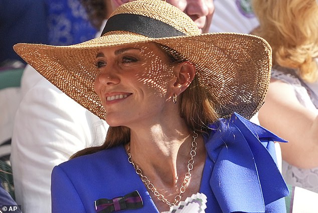 Kate dons a stylish wide-brimmed hat as she watched the Wimbledon final this afternoon