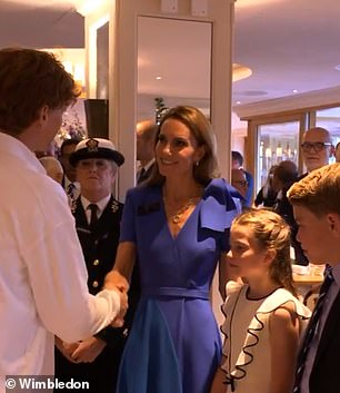 The Wales family looked delighted to meet the Wimbledon winner - as George and Charlotte handed him balls to sign