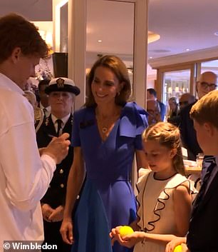 George and Charlotte looked delighted to meet the winner