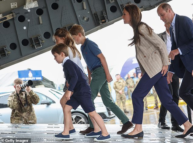William and Catherine with George, Charlotte and Louis board a C17 place during their visit to the Air Tattoo at RAF Fairford on July 14, 2023 in Fairford