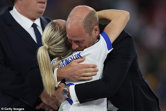 William celebrates with Leah Williamson after the final