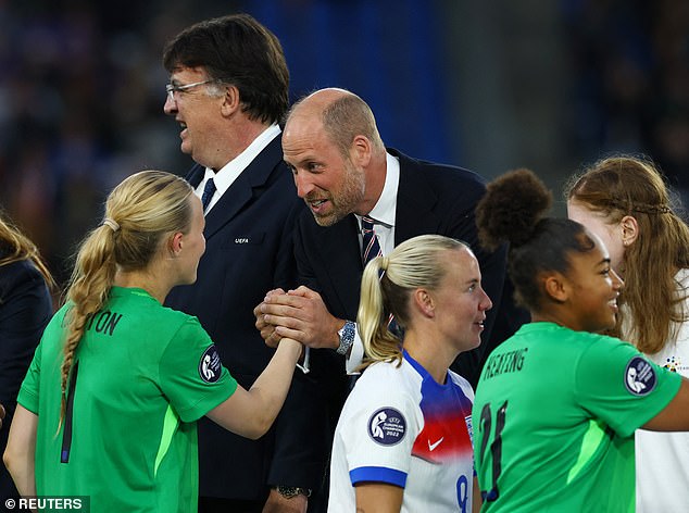 England's Hannah Hampton shakes hands with Prince William