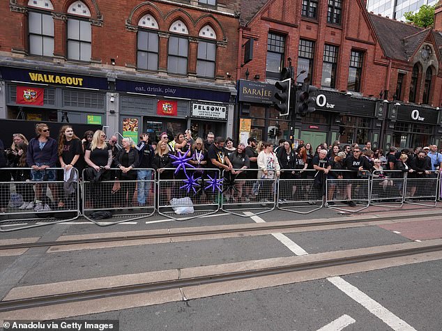 Groups congregated along Broad Street ahead of the procession scheduled for 1pm