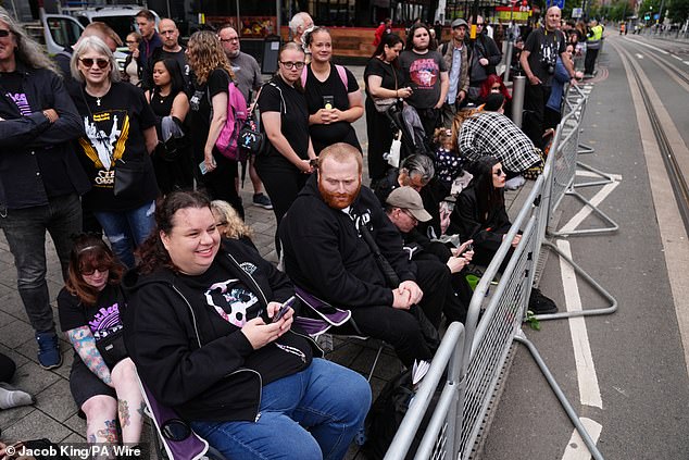 A bench was occupied by Black Sabbath fans on the iconic bridge in Birmingham city centre