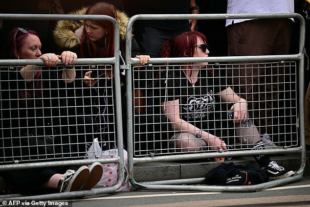 Fans have been seen waiting patiently on the streets of England's second city to pay tribute