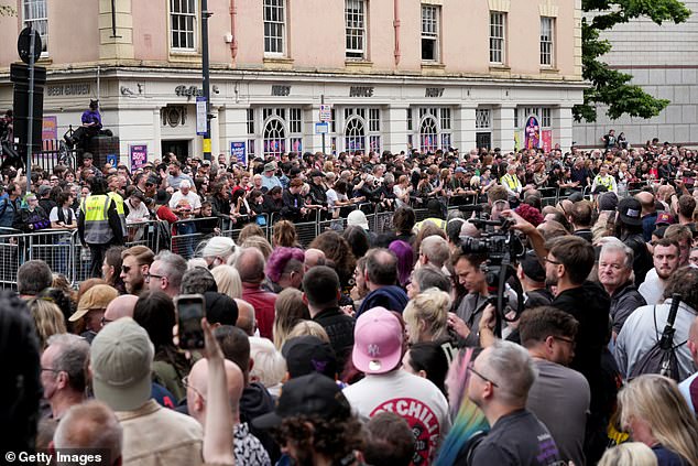 Spectators have been lining the streets of Birmingham's Broad Street thoroughfare