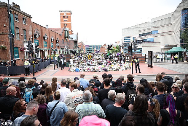 Huge crowds have turned out in Birmingham for rock legend the Black Sabbath star's funeral