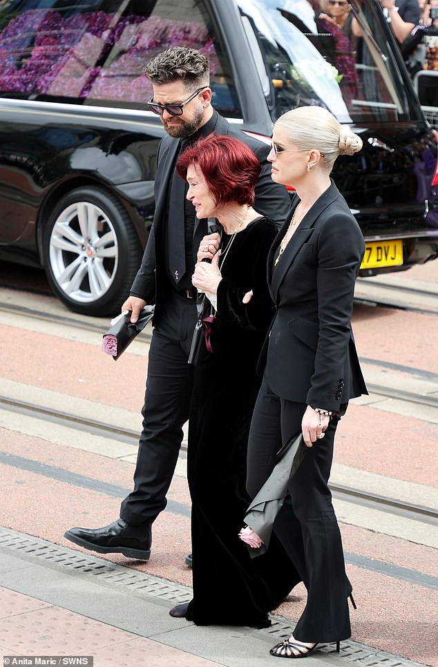 Sharon, Kelly and Jack approach tributes left by Ozzy's adoring hometown