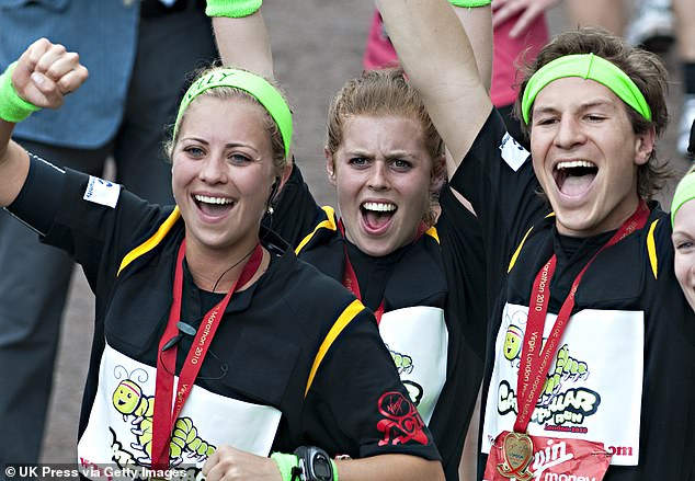 The group broke the record for the most people to finish a marathon while tied together