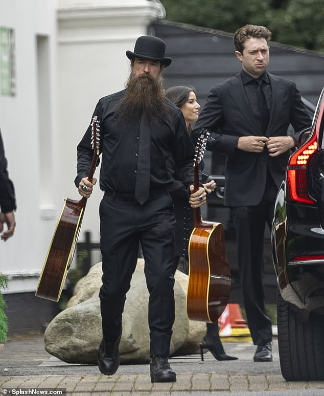 Ozzy's lead guitarist Zakk Wylde also attended the private service holding guitars