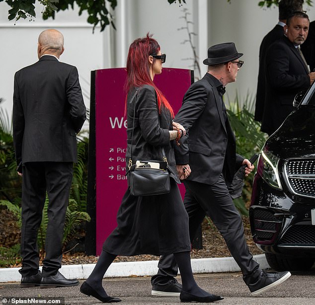 Slipknot's Corey Taylor and his wife Alicia Dove were seen making their way to the event