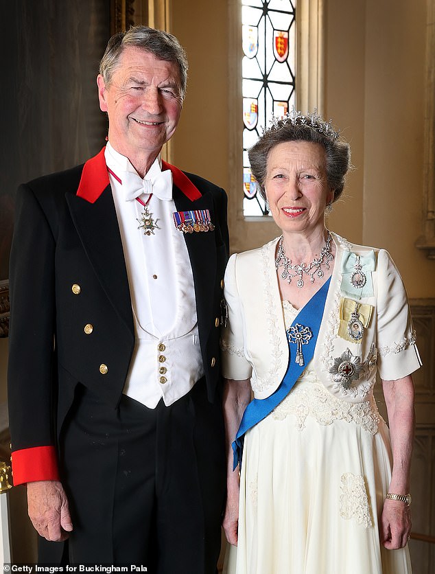 The 14th ¿fact¿ was that ¿Her Royal Highness also has two stepchildren from her second marriage to Sir Timothy Laurence, Tom and Amy Laurence¿. Pictured: Princess Anne with her husband Sir Tim Laurence