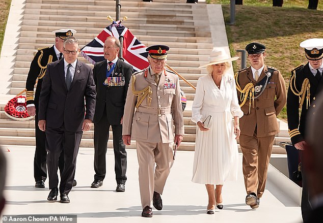Prime minister Sir Keir Starmer, King Charles III and Queen Camilla arrive for the national Service of Remembrance