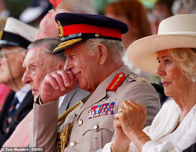 King Charles held back tears during the service with Queen Camilla visibly touched by the veteran's words