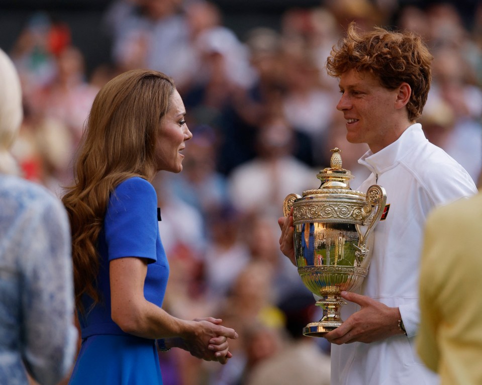 Jannik Sinner with the Wimbledon trophy and Catherine, Princess of Wales.