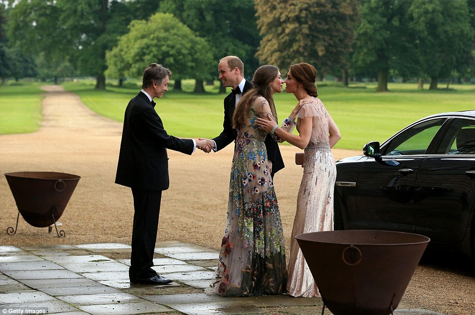 Prince William and Kate were greeted by David Cholmondeley, Marquess of Cholmondeley and Rose Cholmondeley, the Marchioness of Cholmondeley as they arrived at the gala