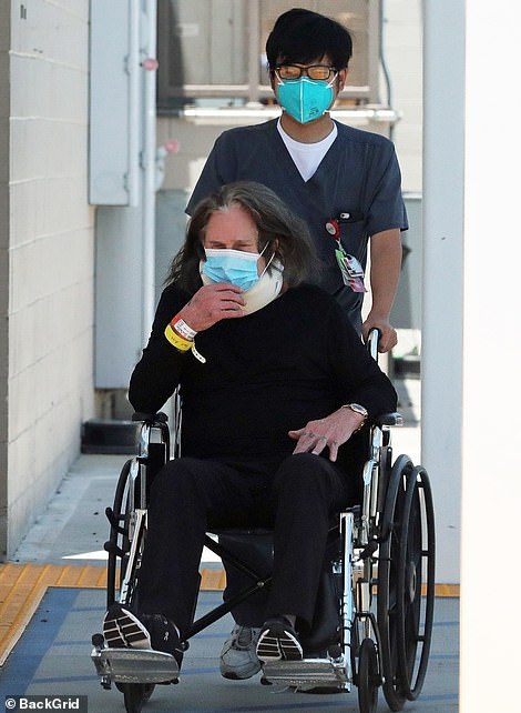 Ozzy Osbourne, who has died aged 76, had a career that was defined by his antics both on and off-stage. Pictured: The star leaving hospital on June 16, 2022, after a major back operation