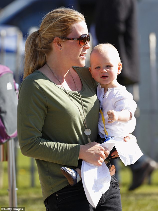 The second daughter of Peter Phillips and now his ex-wife Autumn, Isla, was born on March 29, 2012. Pictured: Autumn carrying her daughter Isla at the Badminton Horse Trials in 2013