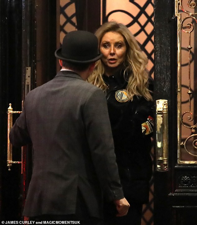 Carol leaving the restaurant after Anita's birthday dinner
