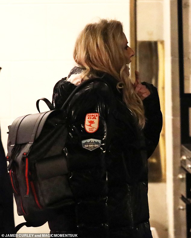 Carol left the restaurant carrying a rucksack on her back