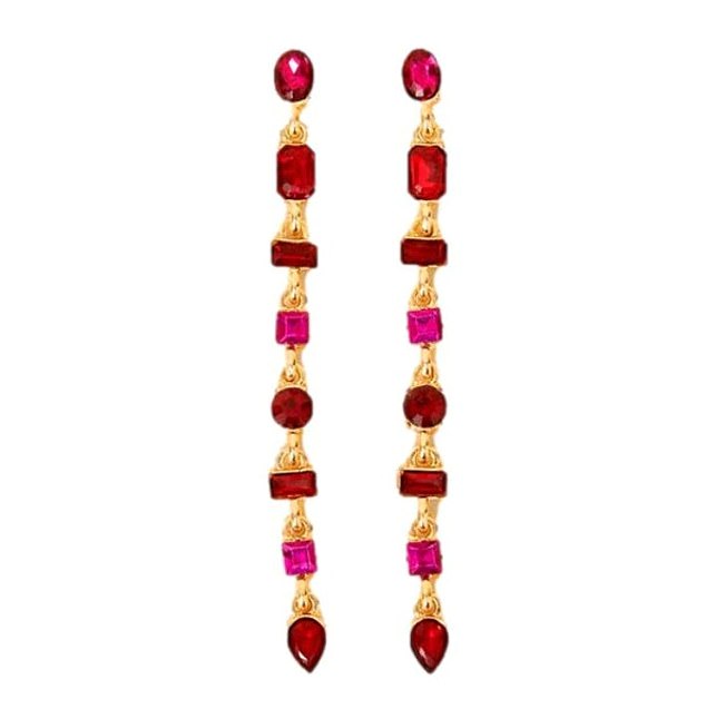 She elevated the look with an exquisite pair of drop earrings that looked far more expensive than their £14 price tag