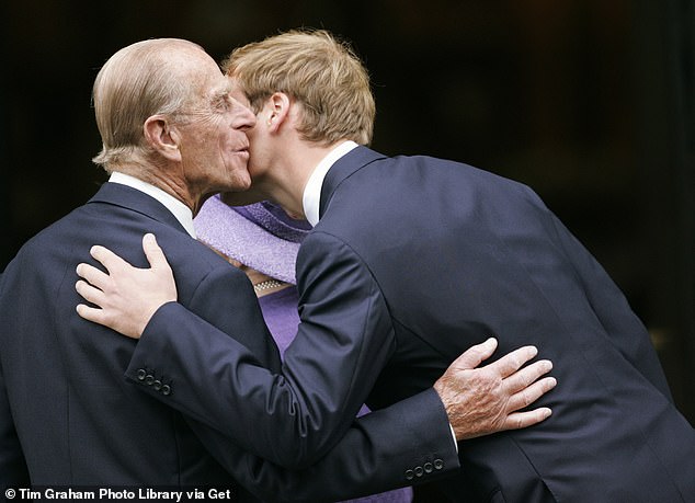William greets his grandfather at the tenth anniversary memorial service for his mother at Guards Chapel at Wellington Barracks on August 31, 2007