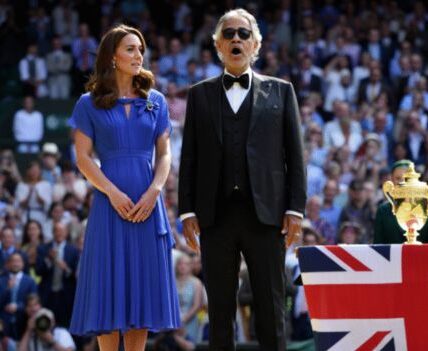 Wimbledon had never seen silence like this. No announcement. No spotlight. Just the Princess of Wales stepping onto Centre Court beside Andrea Bocelli, as 15,000 spectators fell still — breath held, hearts paused. And then, with no microphone, Catherine began to sing: “God Save the King.” Her voice — delicate yet steady — intertwined with Bocelli’s soaring tenor, lifting through the summer air like a prayer wrapped in tradition. It wasn’t just a performance. It was a moment. Some called it a symbol of unity. Others, a quiet message in uncertain times. But one thing is certain: Catherine’s voice didn’t just echo across Centre Court… it echoed across a nation. 👇👇 WATCH THE MOMENT THAT MADE HISTORY