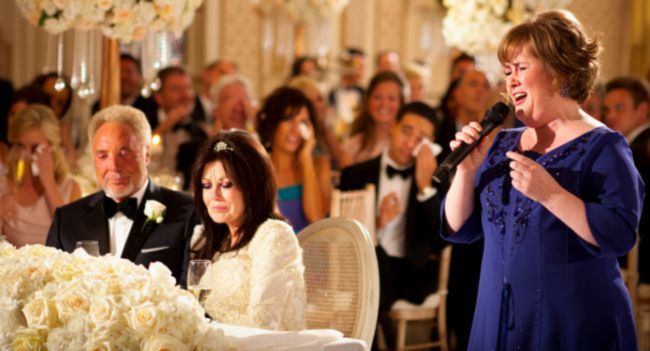 “I’ve waited a lifetime for this moment…” – Susan Boyle whispered as she stepped onto the stage, and within seconds, the entire room fell silent. Tears, Whispers & One Stunning Voice: Susan Boyle steals the show at Tom Jones & Priscilla Presley’s surprise wedding – but wait… why weren’t certain people invited? In a fairytale ceremony nobody saw coming, the legendary couple tied the knot in front of a small circle of handpicked guests — and just when the emotion peaked, Susan’s voice soared through the air like a prayer. Goosebumps. Tears. Applause. But as the last note faded, the gossip began. From missing family faces to whispered feuds straight out of vintage Hollywood tabloids, not everything at this wedding was as dreamy as it seemed. Was it the most magical “I do”… or a powder keg in designer heels? WATCH THE VIDEO and decide for yourself.
