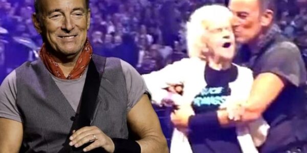 “I never thought this day would come,” Jeannie whispered, tears in her eyes. At 91, after attending over 200 Bruce Springsteen concerts, she was finally pulled from the crowd. As Bruce reached for her hand and helped her onto the stage, the arena fell silent. Under the lights, they danced — not as rock star and fan, but as two souls connected by decades of music and devotion. Jeannie’s eyes shimmered, Bruce smiled with quiet reverence, and the crowd stood still, swept up in a moment that felt timeless. When he kissed her hand goodbye, the silence shattered into thunderous applause — proof that some dreams wait, but never fade. Watch the unforgettable moment below