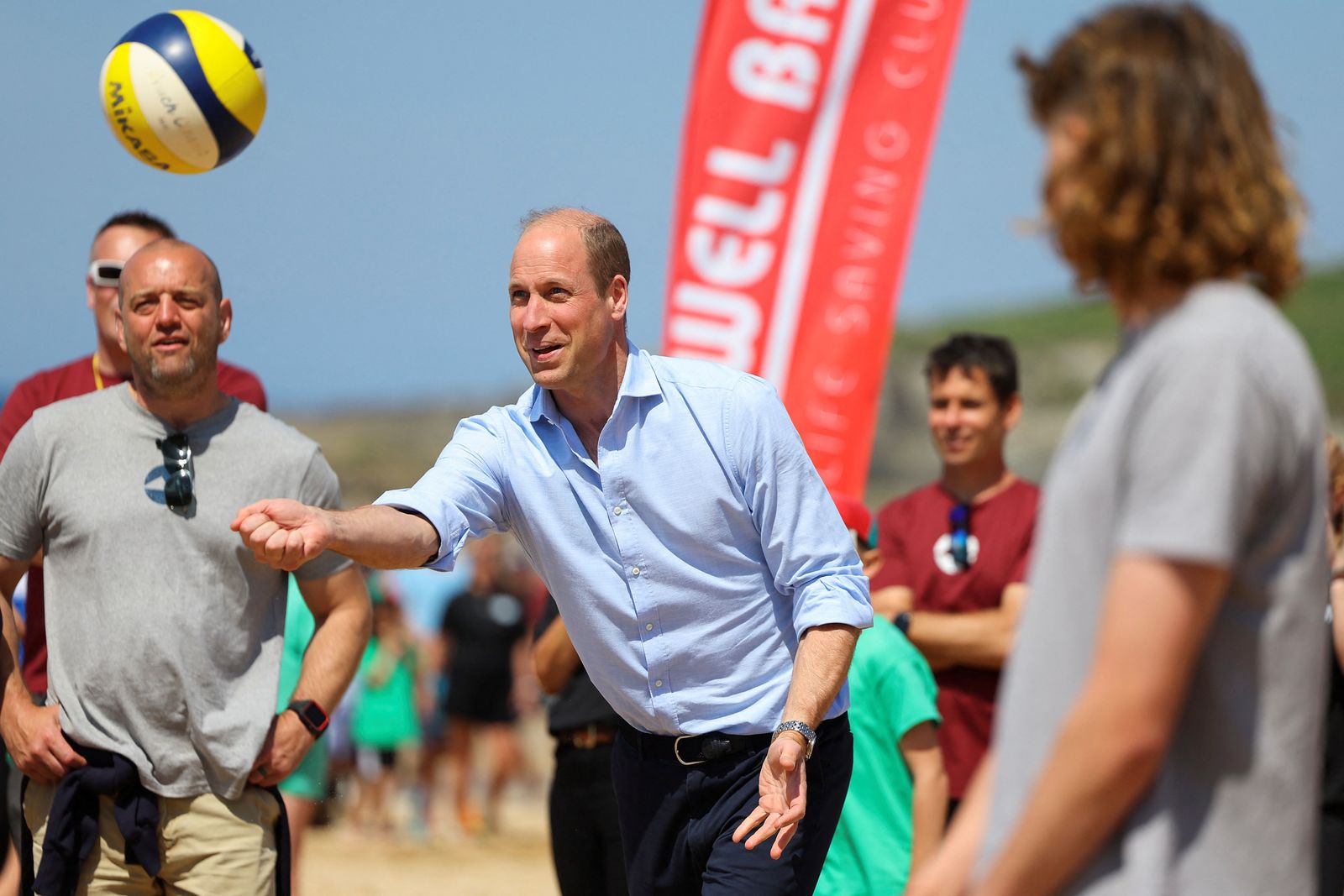 A royal Baywatch moment? Prince William leaves fans swooning as he plays  volleyball on the beach | Tatler