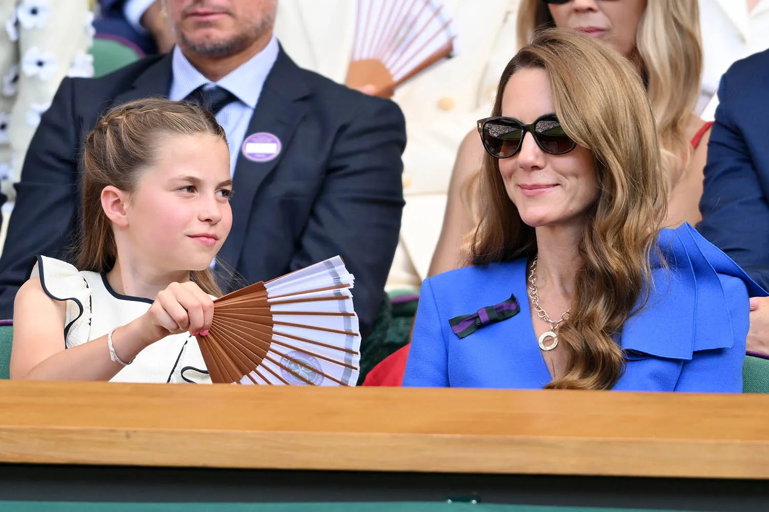 Princess Charlotte of Wales and Catherine, Princess of Wales attend day fourteen of the Wimbledon Tennis Championships at the All England Lawn Tennis and Croquet Club at All England Lawn Tennis and Croquet Club on July 13, 2025 in London, England
