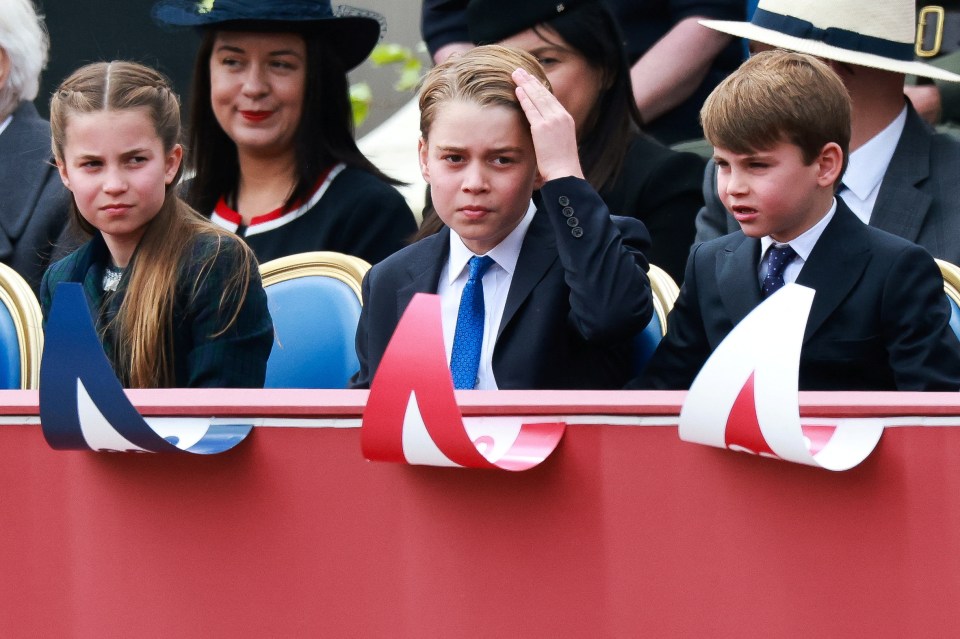Prince George, Prince Louis and Princess Charlotte sit in attendance on the day of the armed forces and veterans' parade commemorating the 80th anniversary of Victory in Europe (VE) Day in London, Britain, May 5, 2025. REUTERS/Phil Noble