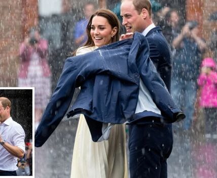 What began as a simple charity visit turned into one of the most romantic royal moments in years. As the skies opened and rain poured down, William didn’t rush for cover. Instead, he slipped off his jacket, placed it over Kate’s shoulders, and whispered words that melted hearts: “I’d rather be drenched with you than dry without you”  Laughter followed, caught on dozens of phones, and within hours their rain-soaked smiles were being called “the new royal postcard of love”