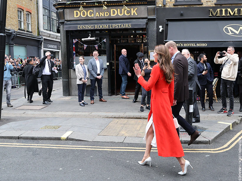William and Kate walking into the Dog and Duck pub