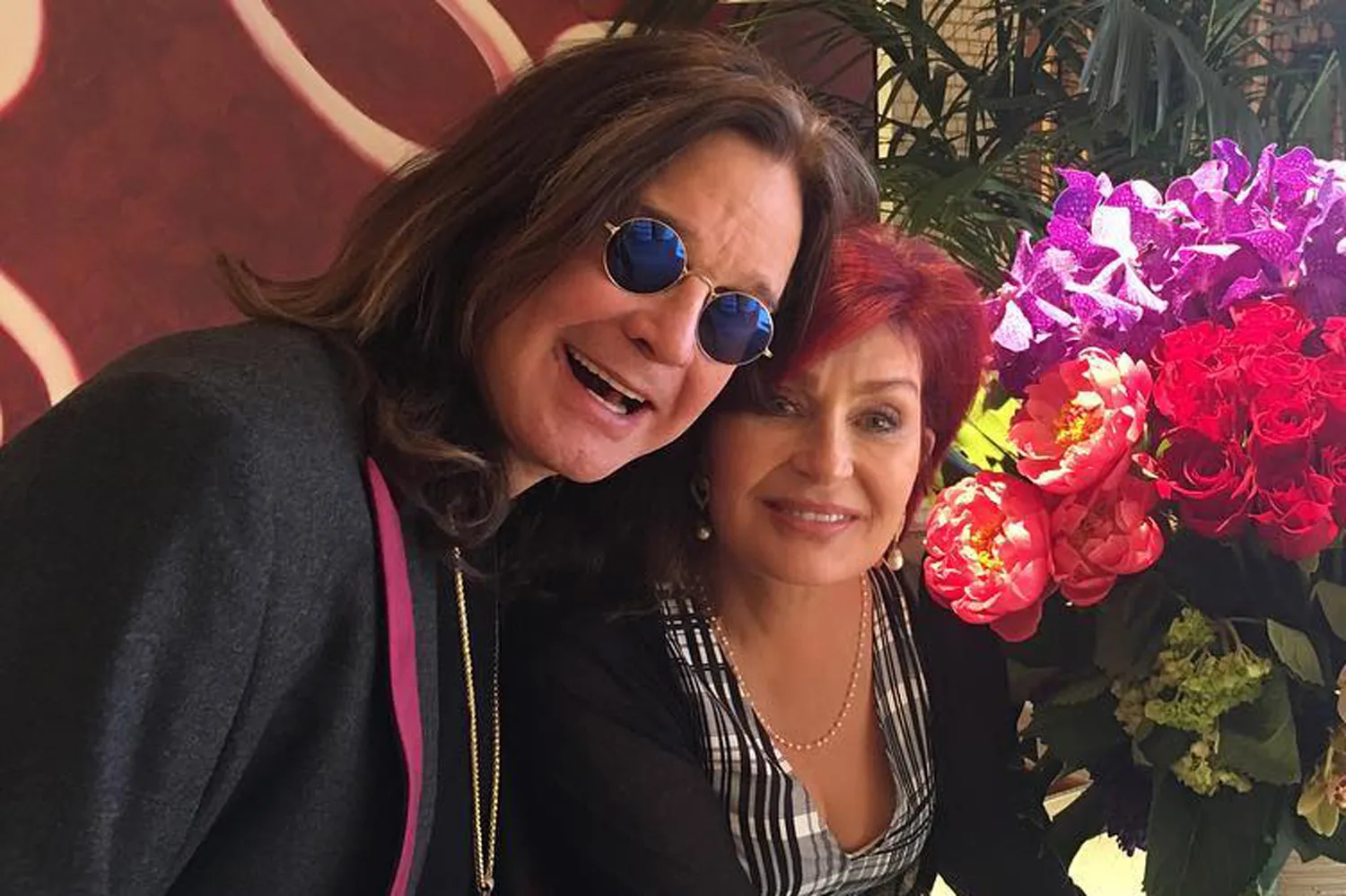 Sharon Osbourne and Ozzy Osbourne smile in a photo together in May 2017.