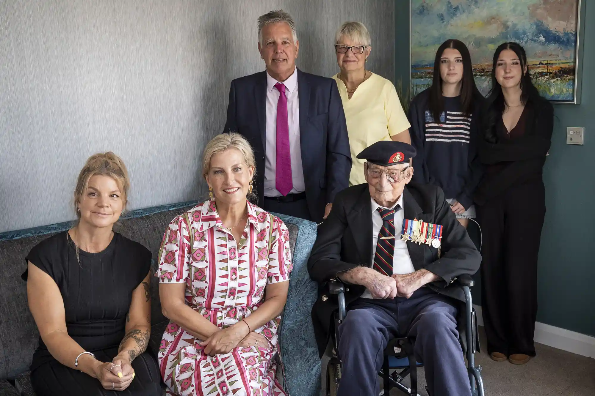 Son-in-law Andy Dables, daughter Denise Dables, great granddaughter Freya Dables, great granddaughter Ellie Dables, (front row left to right) granddaughter Kirsty Dables, Sophie, the Duchess of Edinburgh, patron of the Java Far East Prisoner of War Club 1942 and 105-year-old Royal Marines veteran James 'Jim' Wren pose together at the Old Sarum Manor Care Home in Salisbury, ahead of the 80th anniversary of VJ Day on August 12, 2025 in Salisbury, England.