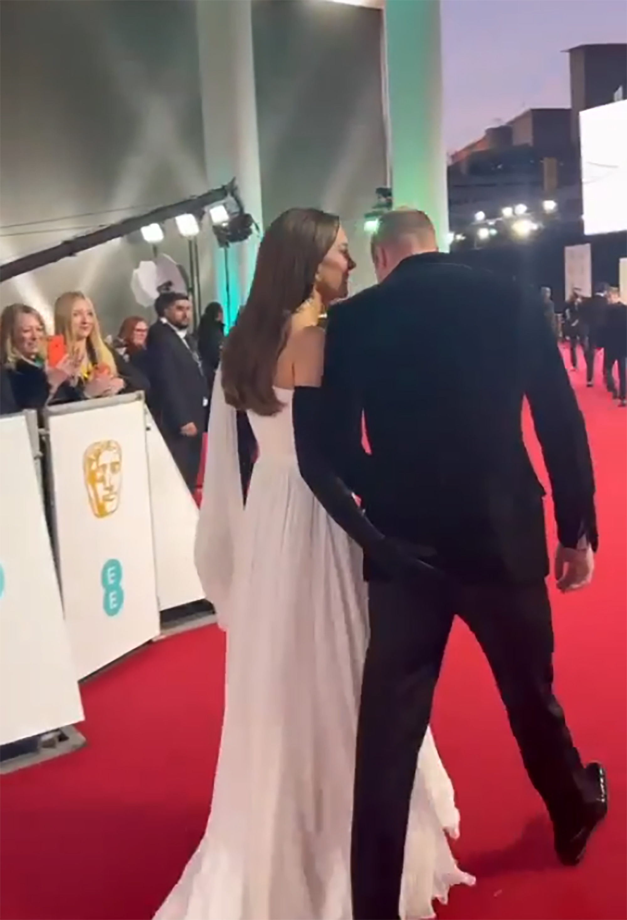Kate Middleton gives Prince William a 'love tap' on BAFTA red carpet