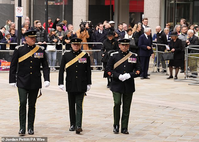 Mourners arrive for the Duchess of Kent's funeral service at Westminster Cathedral today