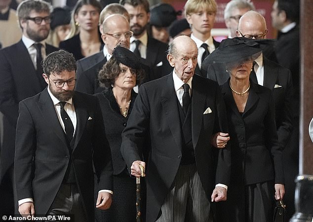 The Duke of Kent arrives with family members for the requiem mass this afternoon