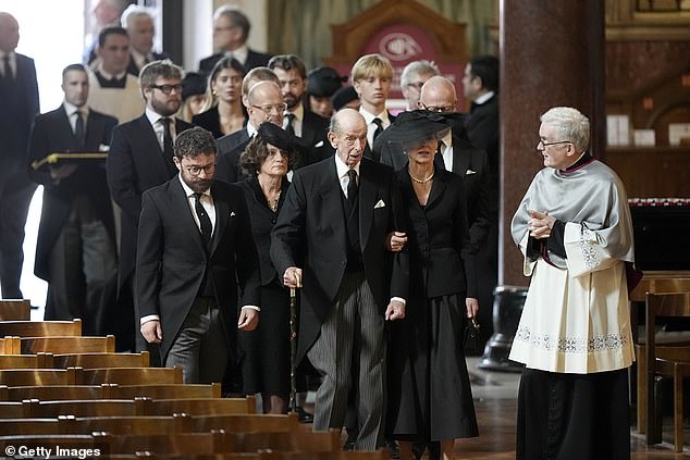 The Duke of Kent arrives with family members for the requiem mass this afternoon